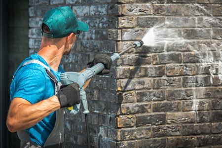 Pressure washing bricks to shingles